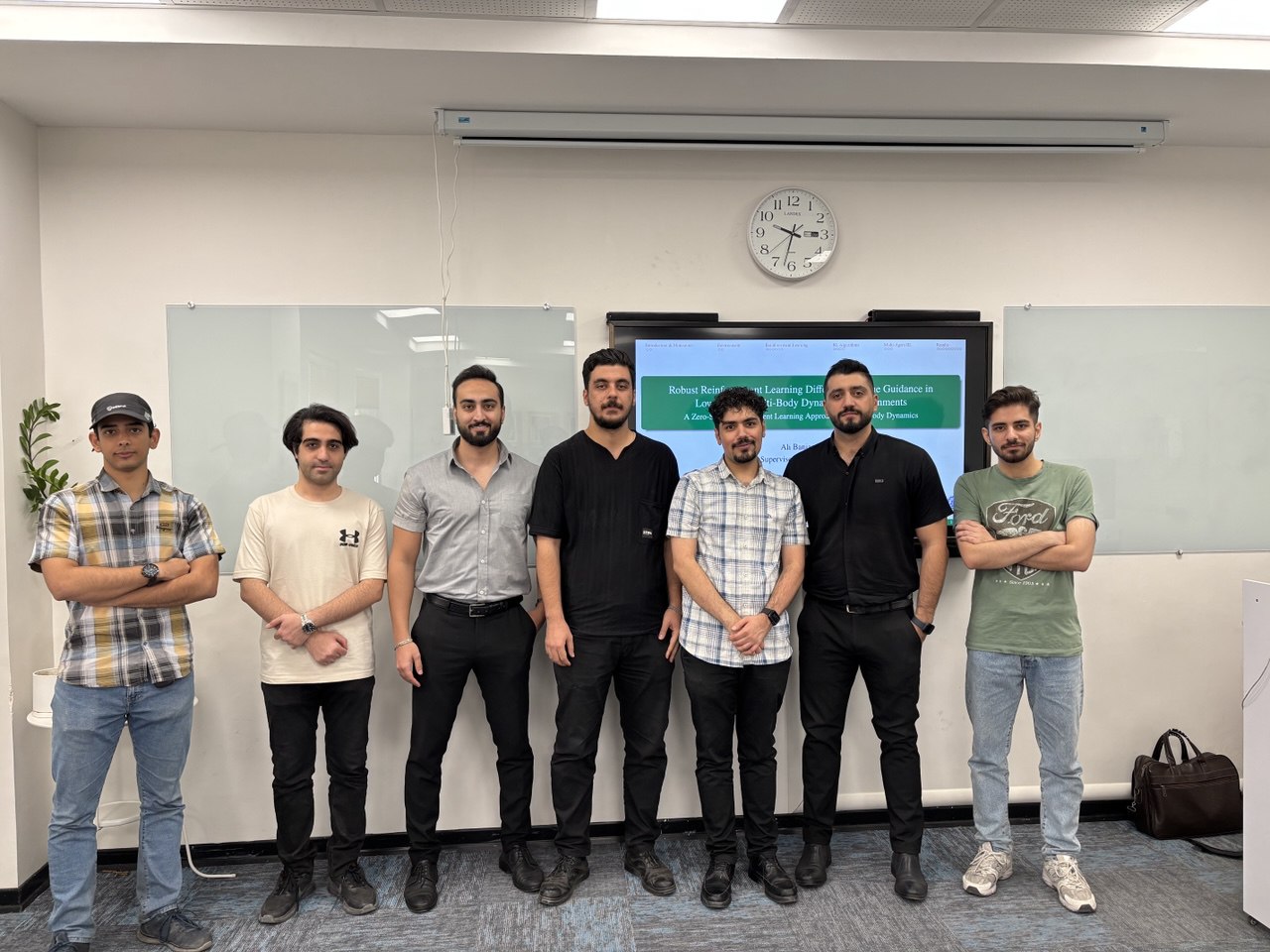 Celebrating with friends after the defense